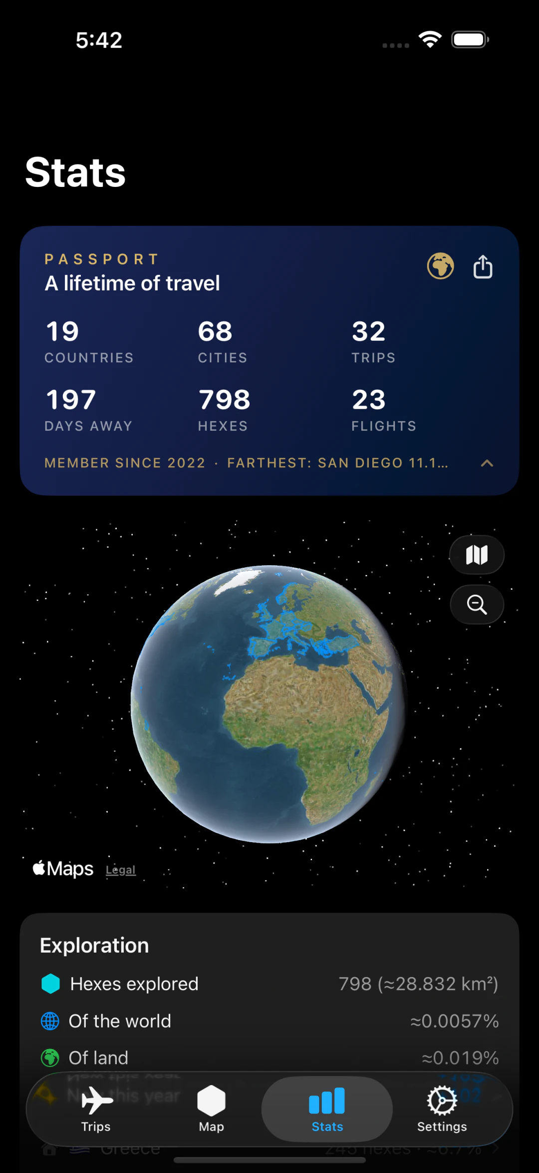 Travel Log's passport statistics and exploration globe showing sample travel across several continents
